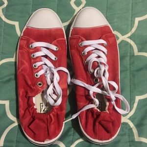 Red canvas slip on tennis shoes